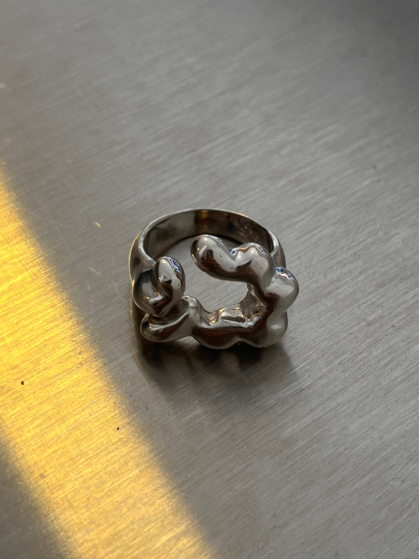 BRETOS anillo liquido plata